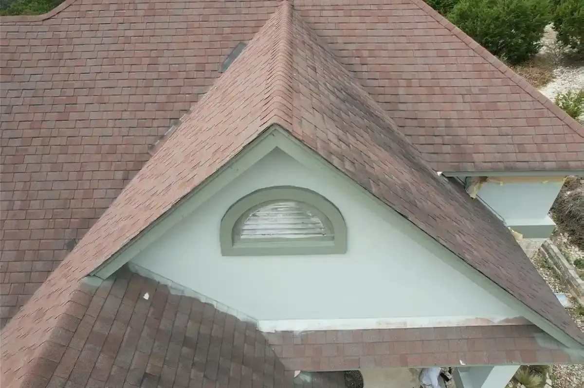 Brown shingle roof with a dormer vent on a Cedar Park home