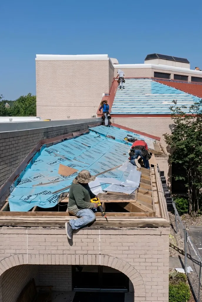 Ark crew repairing and replacing a hail-damaged Georgetown roof